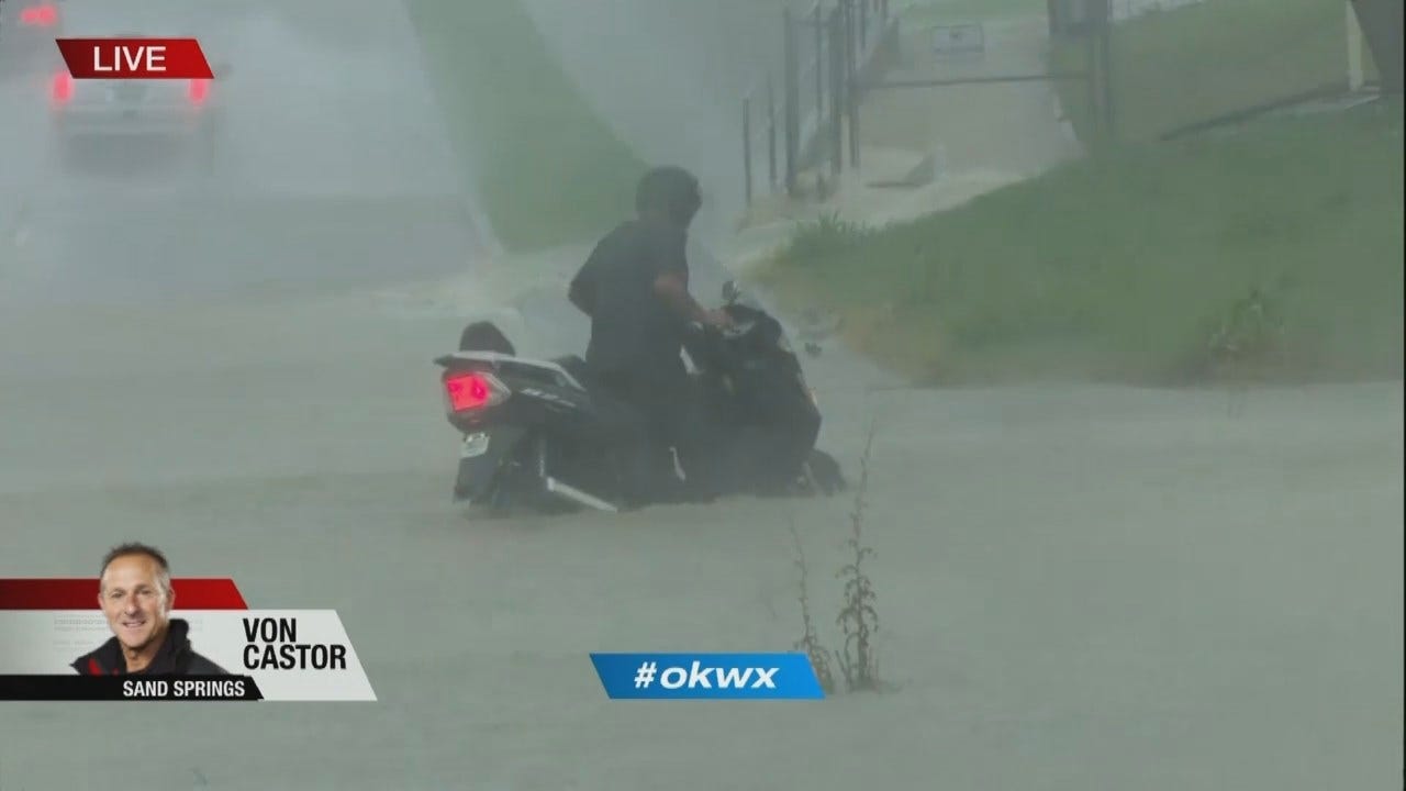 WATCH: Motorcyclist Gets Stuck In Sand Springs Flood Waters