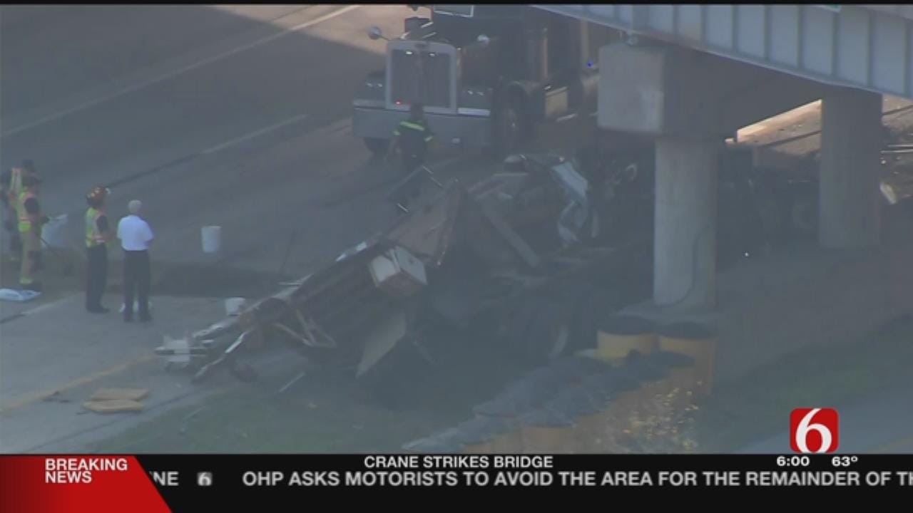 Truck Carrying Crane Hits Overpass On Highway 412 At 65th West Avenue