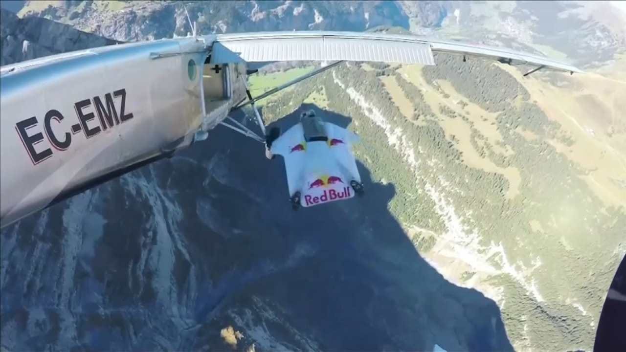 Wing Suit Flyers Board Plane Mid-Air