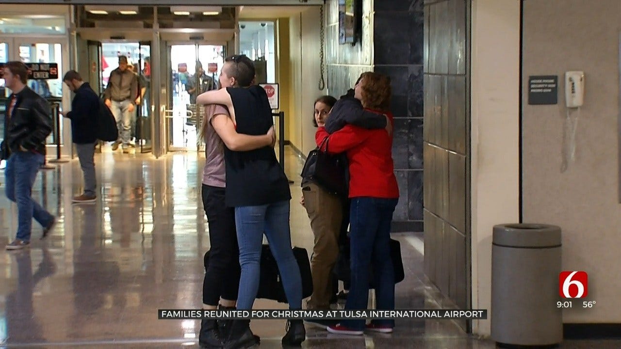 Families Reunite At Tulsa International Airport For On Christmas Eve
