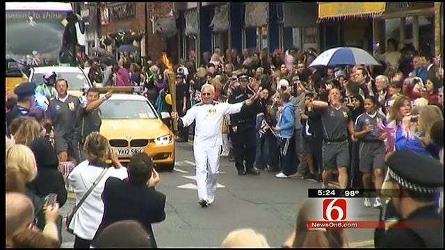 Tulsa Doctor Runs With Olympic Torch In England