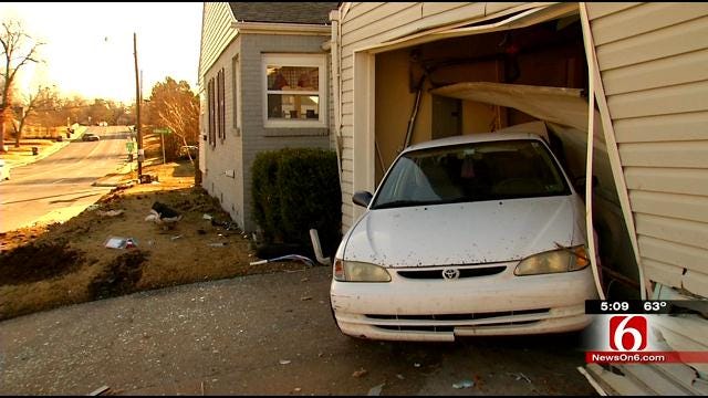 Tulsa Police: Abandoned, Rolled-Over SUV Linked To Car Smashed Into Garage