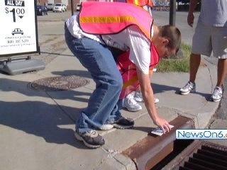 Volunteers Try to Keep it Out of the Gutter
