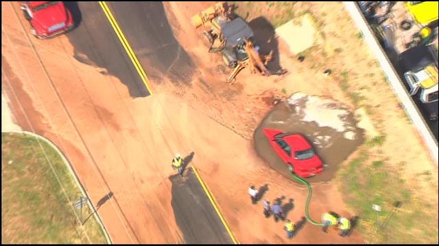 WEB EXTRA: Car Crashes Into Sinkhole In Downtown Oklahoma City