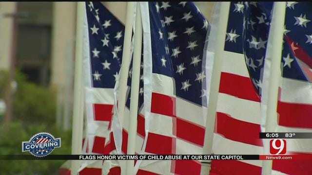 Flags Honor Victims Of Child Abuse At State Capitol