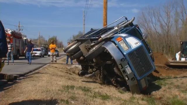 WEB EXTRA: Storey Wrecker Gets Overturned Dump Truck Right Side Up