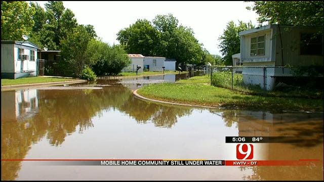 Floodwaters Still Keeping MWC Residents From Going Home