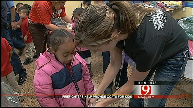 OKC Firefighters, Organization Donate Coats To Elementary School Children