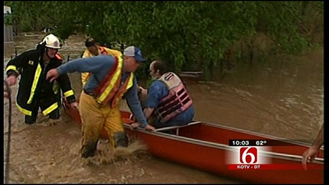Firefighters Rescue Man, Dogs From Flooded Adair County Home