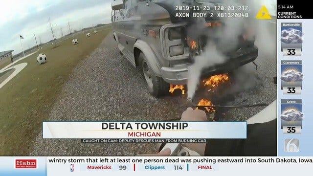 Michigan Deputy Saves Man From Burning Car