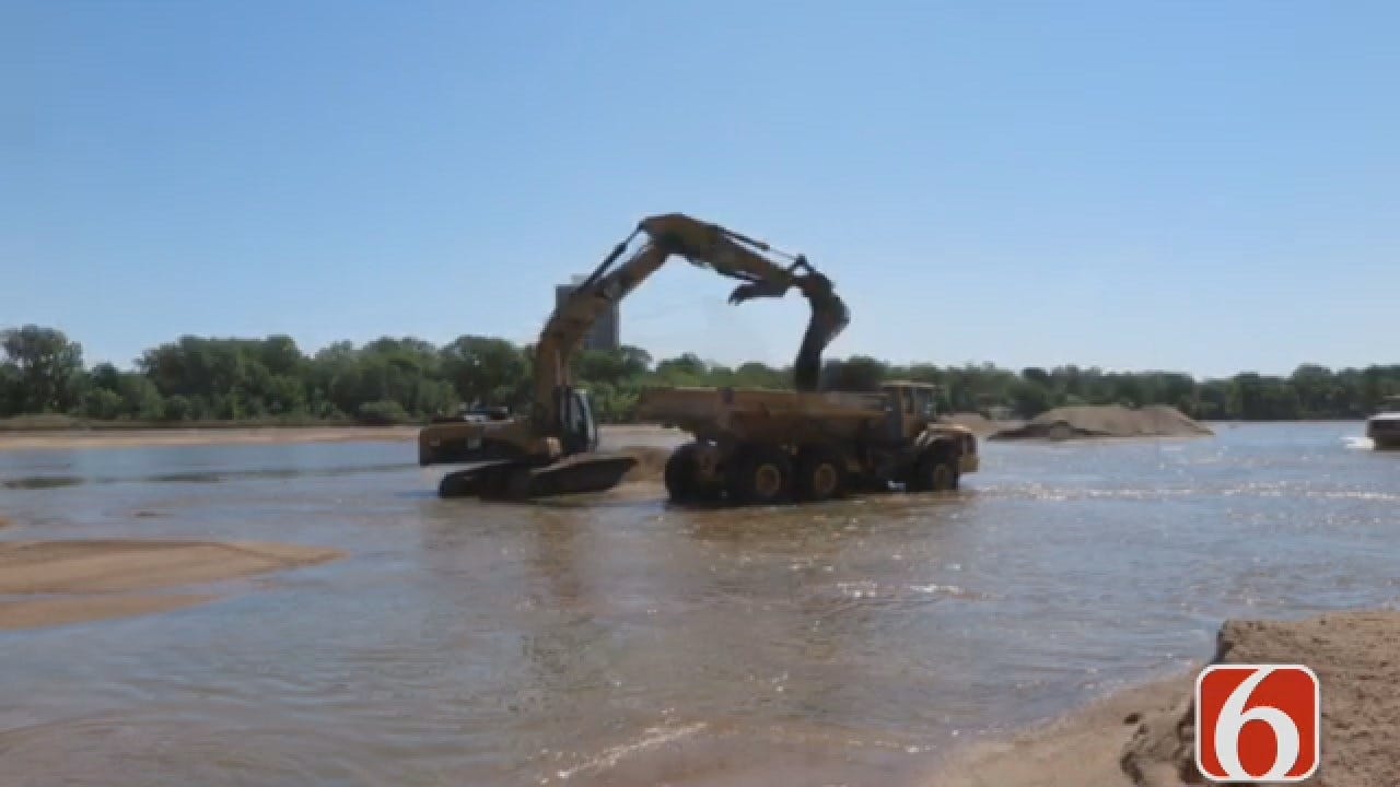 Emory Bryan: Construction Crew Races To Move Sand In Arkansas River Bed