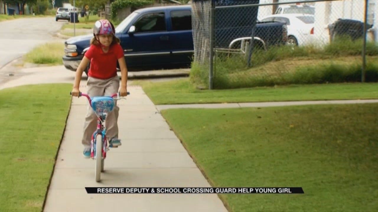 Deputies, School Crossing Guard Buy Young Girl New Bike