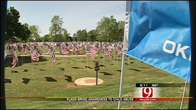 Flags Fly Near State Capitol To Bring Awareness To Child Abuse