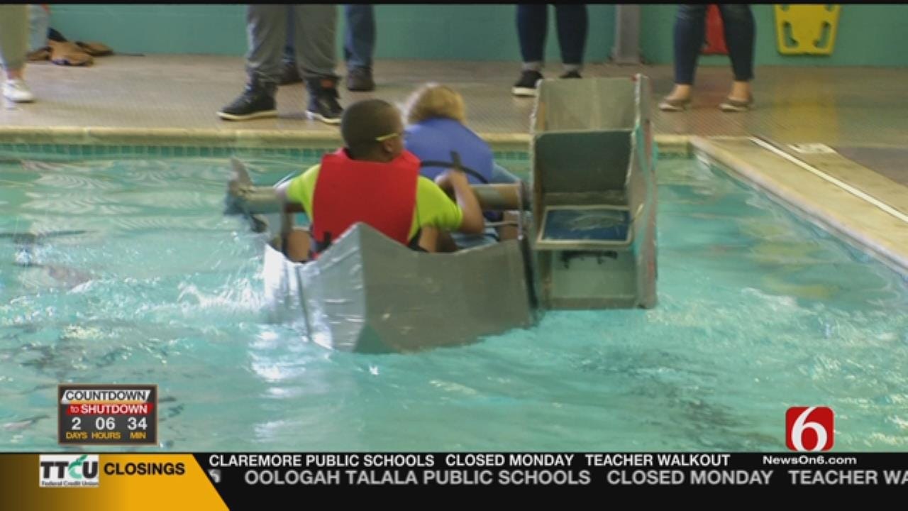 OK Students Use STEM Skills To Build Cardboard, Duct Tape Boats