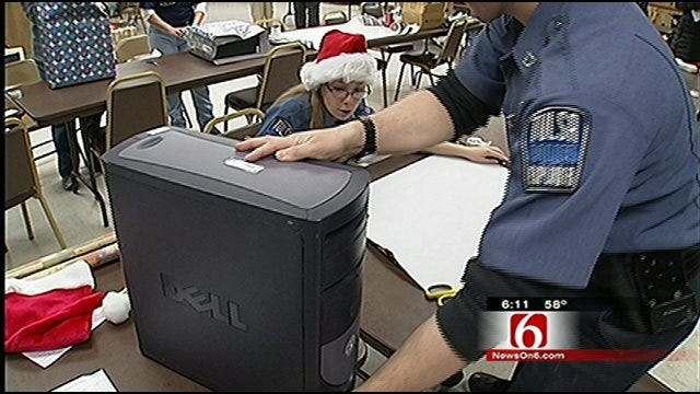 Tulsa Police Officers Deliver Early Christmas Gifts To Area Families