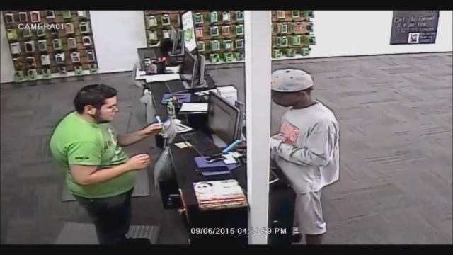 WEB EXTRA: Man Caught On Camera Robbing OKC Cricket Store At Gunpoint