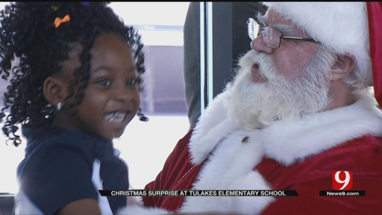 Santa Brings Gifts To Putnam City Elementary Students