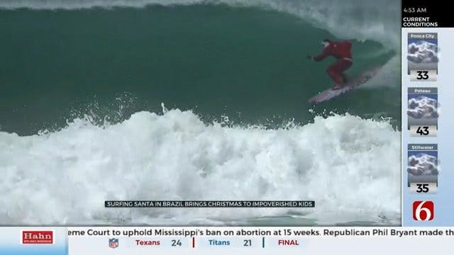 Surf's Up: Santa Hits The Waves In Brazil