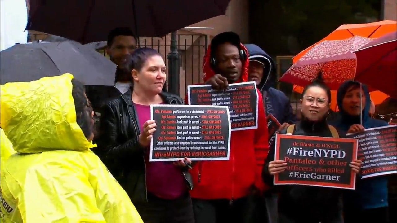 Protesters Rally For Justice For Eric Garner Outside NYPD's Office