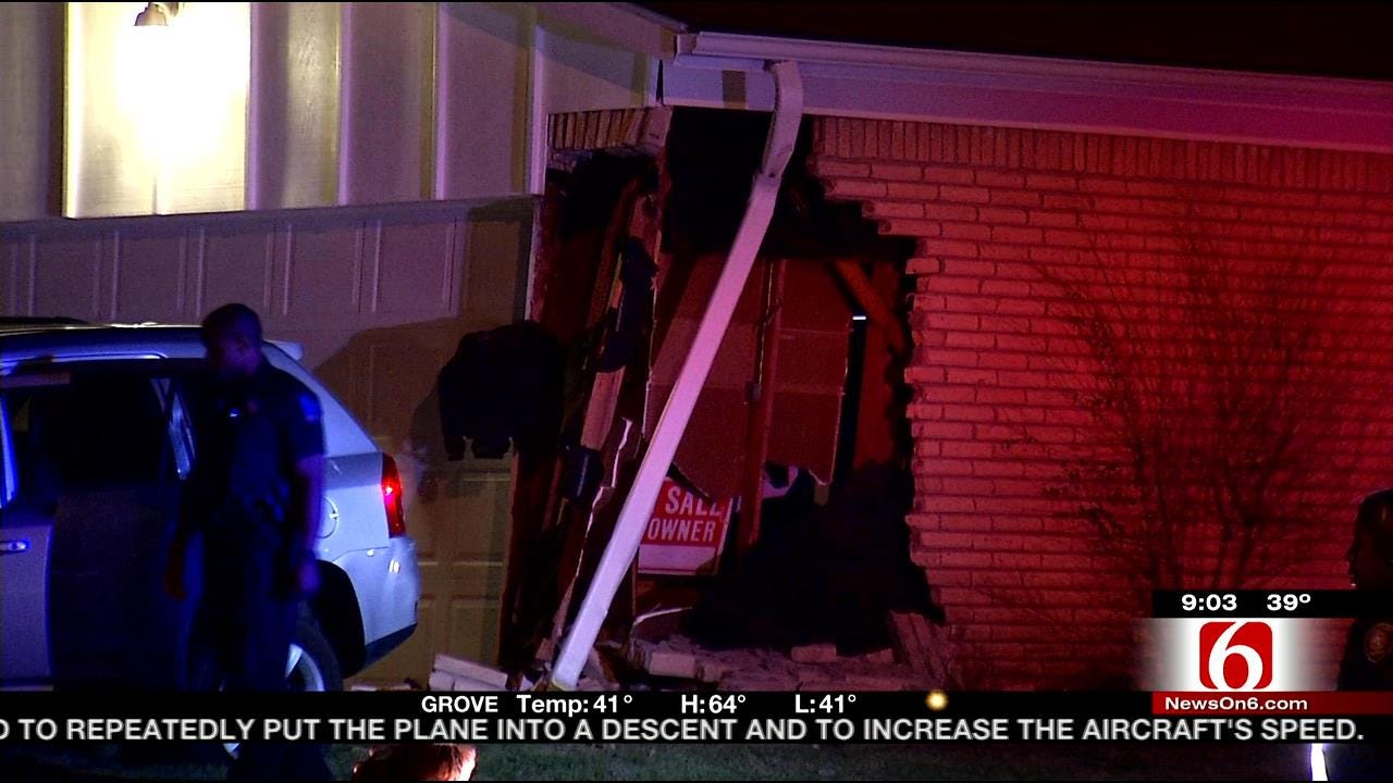 Tulsa Police Arrest 2 After SUV Slams Into House