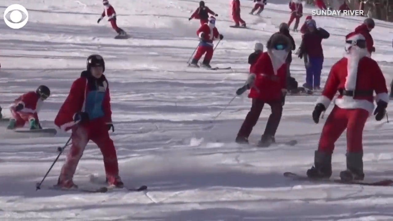 WATCH: 200 Santas Hit The Ski Slopes