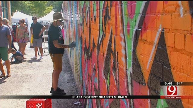 Artists Paint Plaza District's First Urban Art Mural
