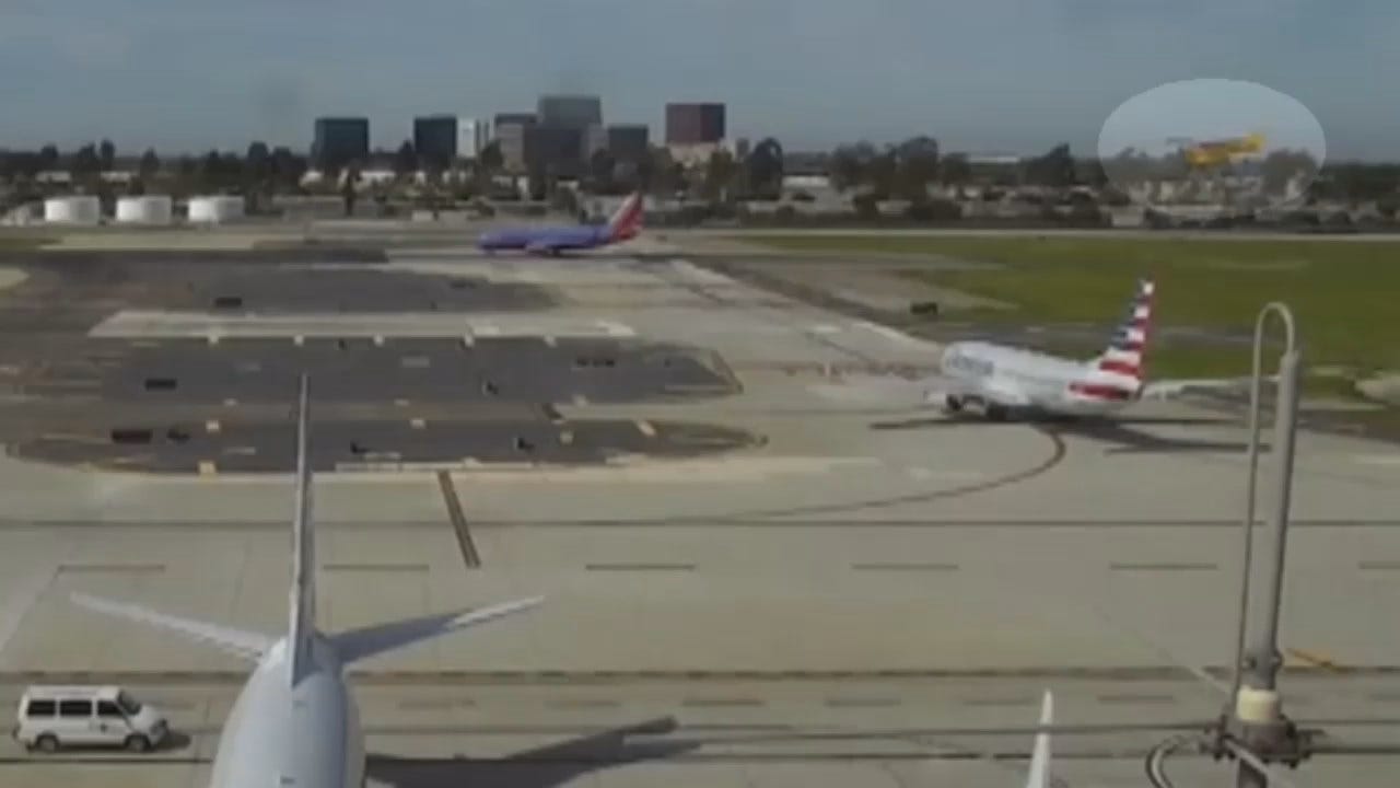 WEB EXTRA: Video Of Harrison Ford's Plane Flying Over Airliner