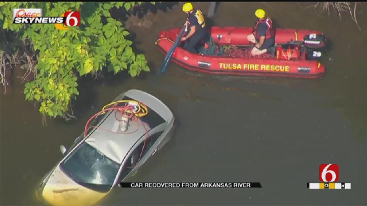 Tulsa Firefighters Work To Get Stolen Car In The Arkansas River To Shore