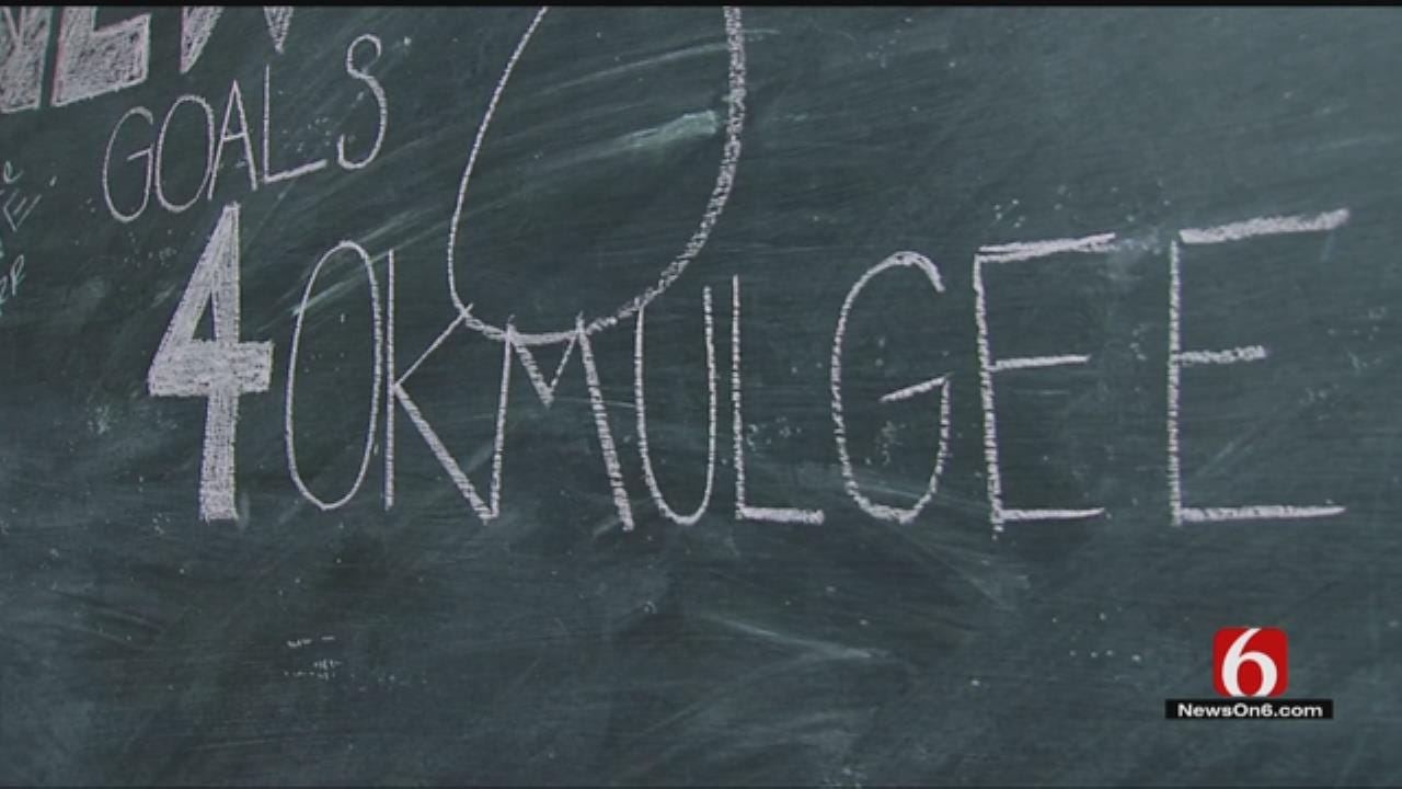 Residents Writing Down New Year's Resolutions For City Of Okmulgee