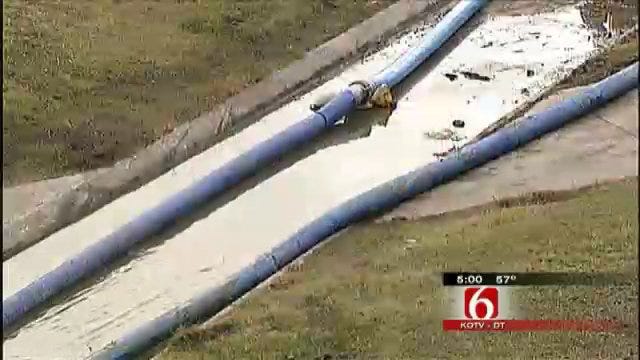Tulsa Police Drain Retention Pond In Search For Body Parts