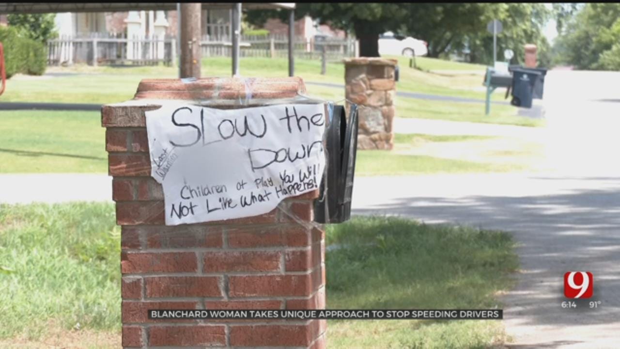 Woman's Expletive-Laced Sign To Stop Speeding Drivers Draws Attention In Blanchard