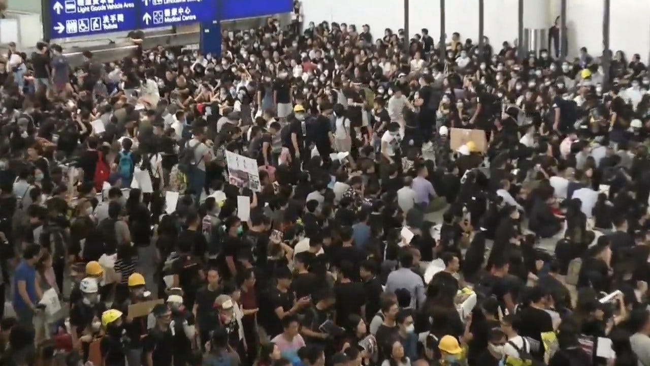 Hong Kong Protests Paralyze 1 Of Asia's Busiest Airports As China Cracks Down