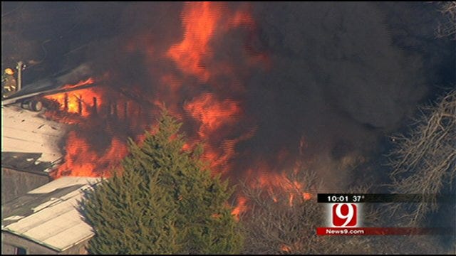 Firefighters Struggle to Save Homes From Large Grass Fire Near Harrah