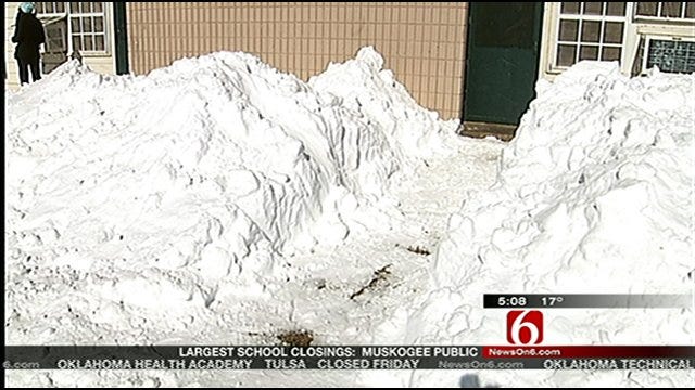 Snow-Stranded Tulsans: Kids Play While Adults Worry