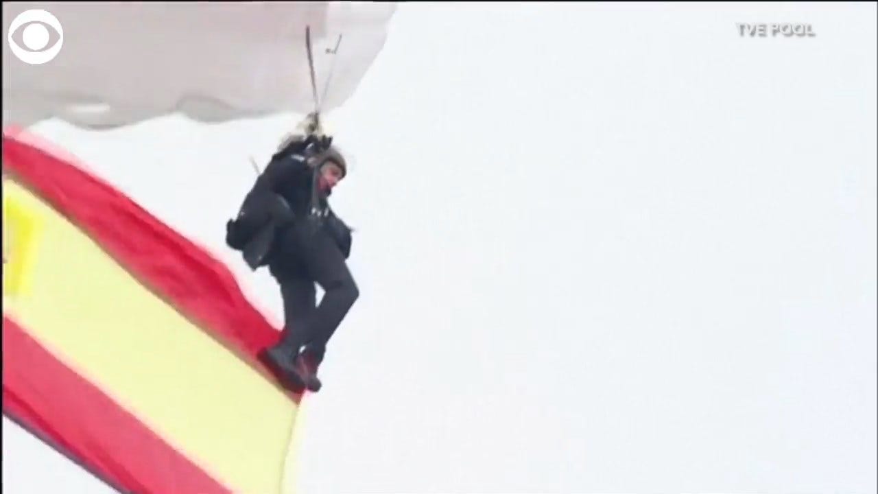 WATCH: Parachutist Crashes Into Lamp Post