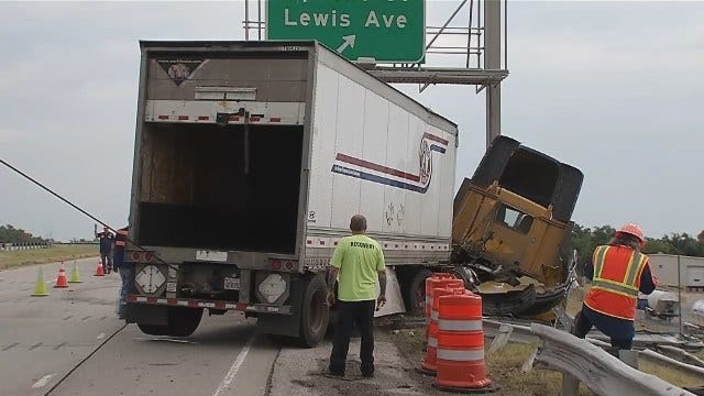 WEB EXTRA: Trucker Wraps Semi Around Tulsa Highway Sign
