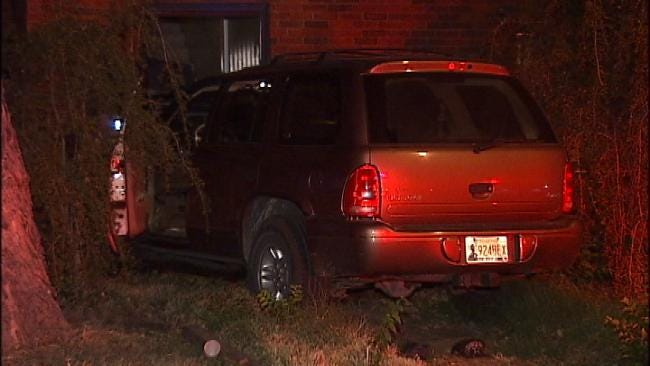 Stolen Dodge Durango Crashes Through Tulsa House