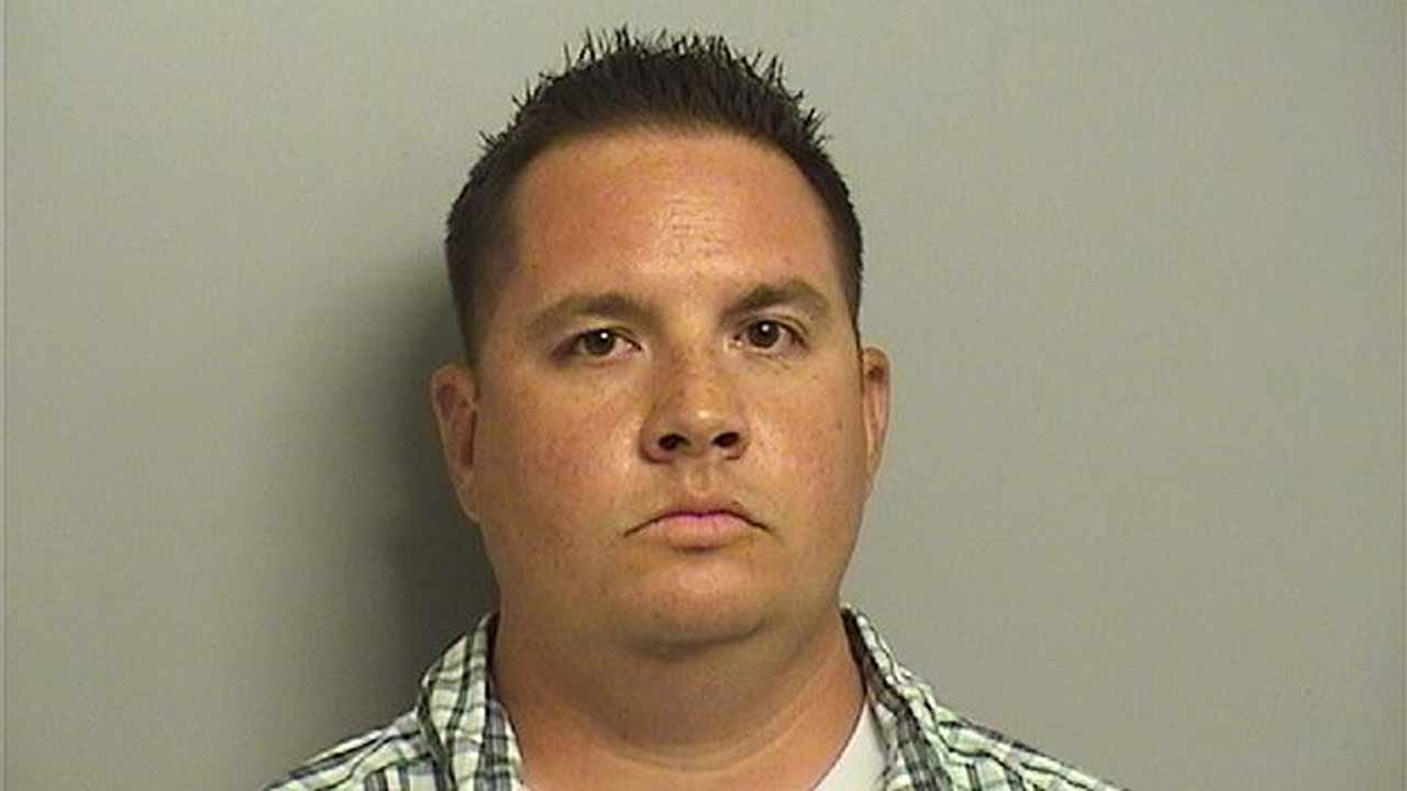 Off-Duty Tulsa Police Officer Charged With Bringing Gun To Bar