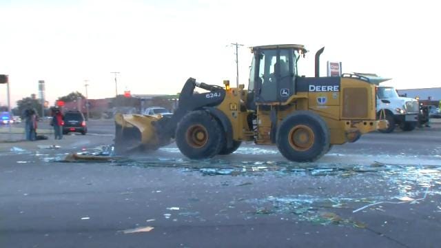 WEB EXTRA: Broken Mirror Glass Cleaned Up At East Tulsa Intersection