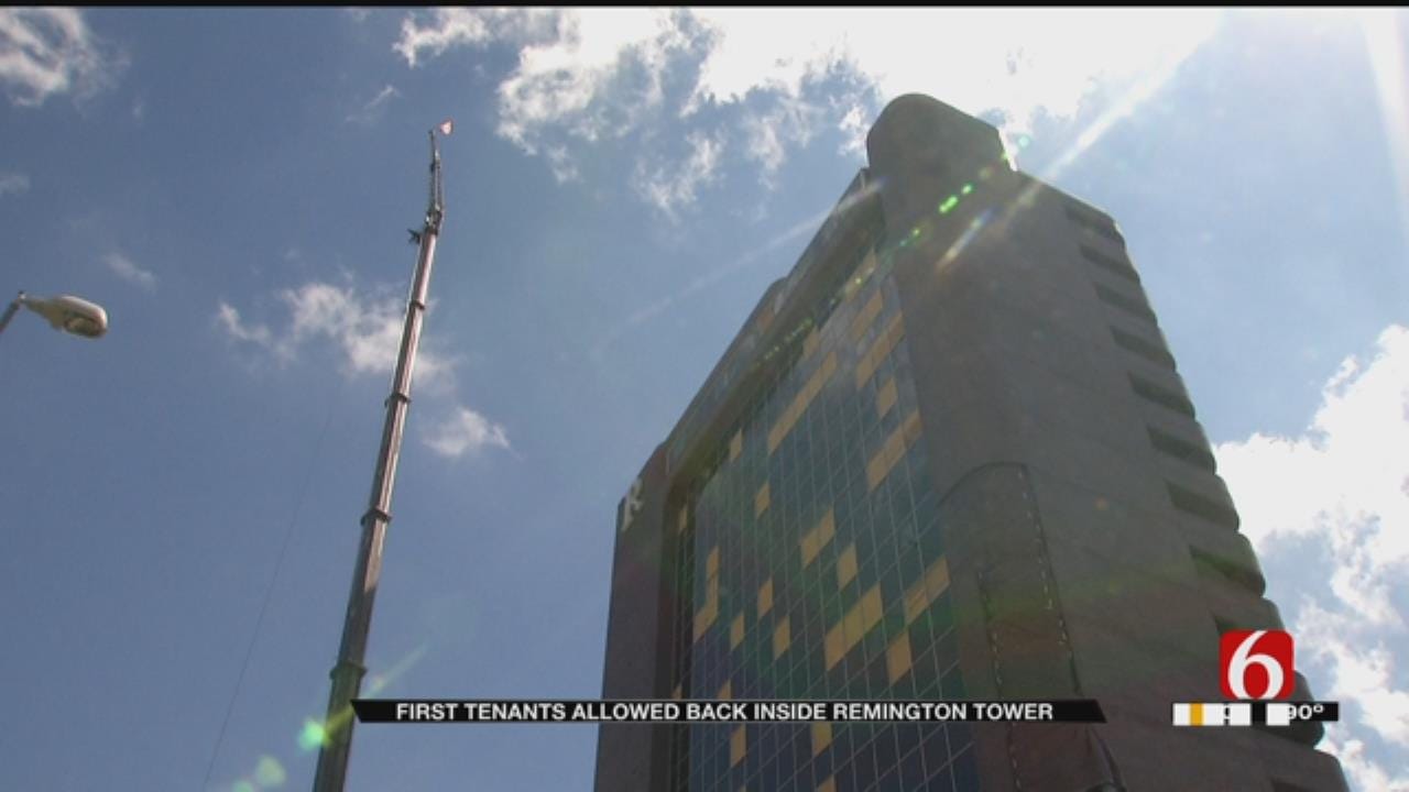 Remington Tower Tenants Retrieve Items Inside Building