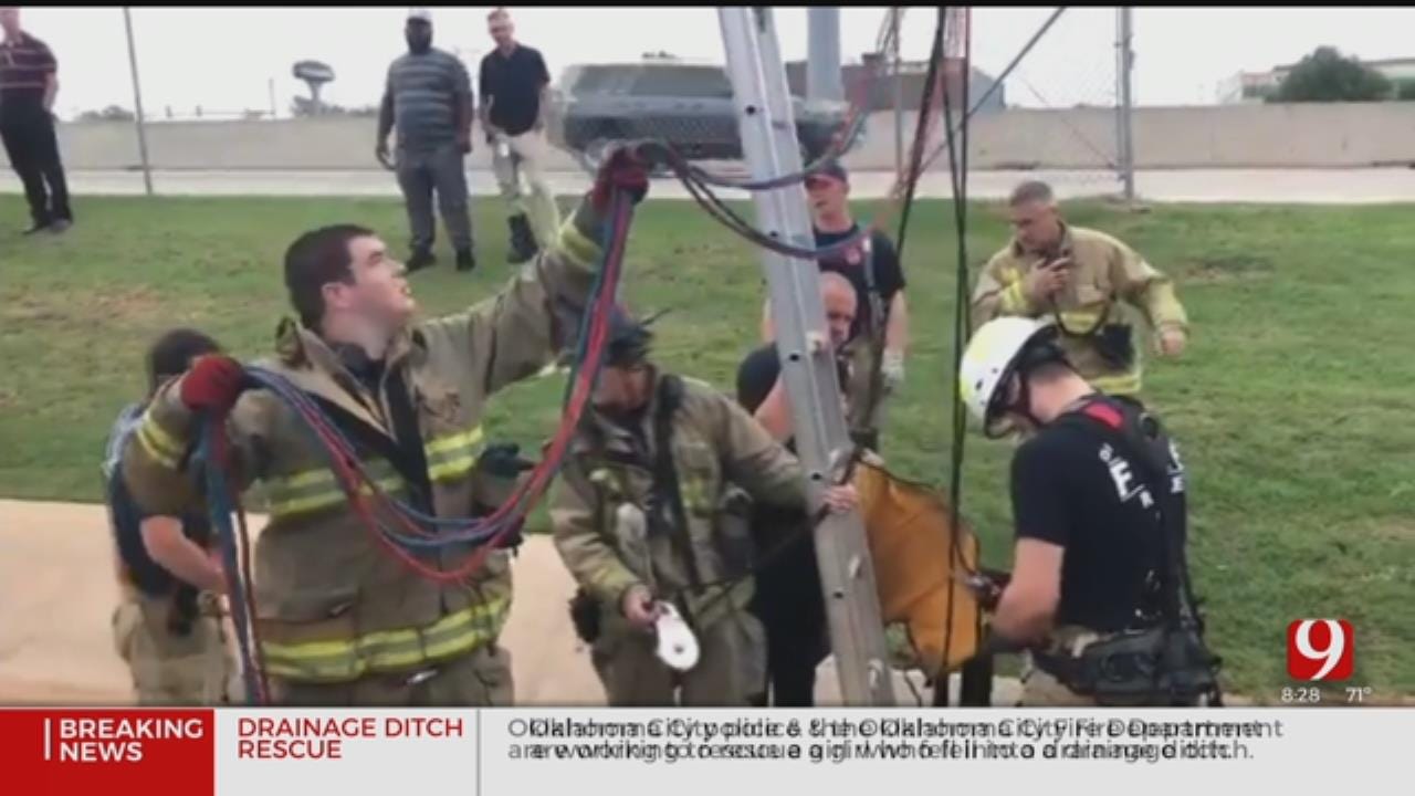 Emergency Crews Working To Rescue Woman From Drainage Ditch In NW OKC