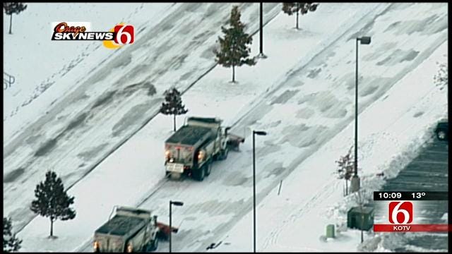 Crews Hard At Work Clearing Snow From Tulsa Christmas Parade Route
