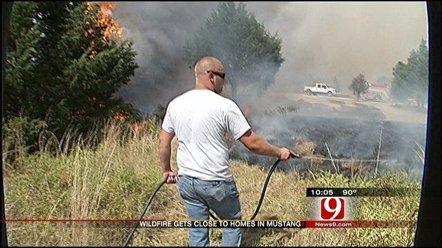 Multiple Fire Departments Extinguish SW OKC Grassfire Threatening Homes