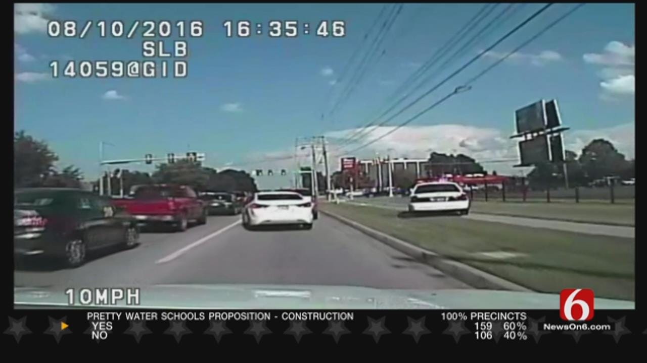 Dashcam Video Shows Chase Between TPD, Murder Suspect