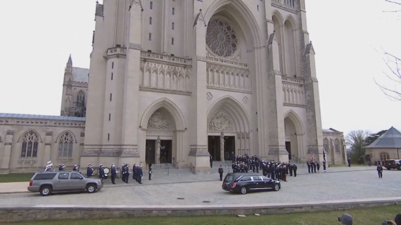 President George HW Bush's Casket Arrives At The National Cathedral