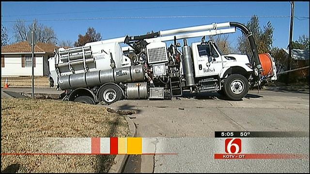 Street Collapses Under City Of Tulsa Utility Truck