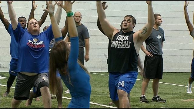 TU Players Attempt To Limber Up With Yoga