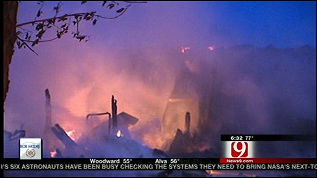 Fire Destroys House In Harrah, Wind Fans Flames