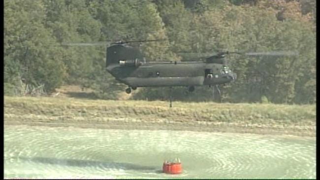 SkyNews6: Chinook Helicopter Drops Water On Wildfire