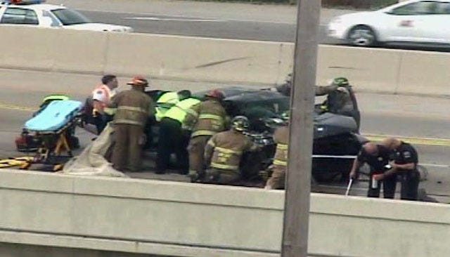 WEB EXTRA: SkyCam View As Firefighters Free Crash Victim